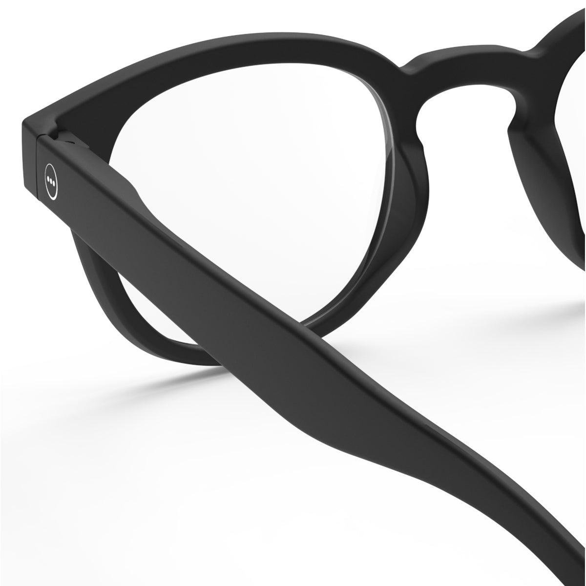 Izipizi shape c black reading glasses close up of back left hand side on white background