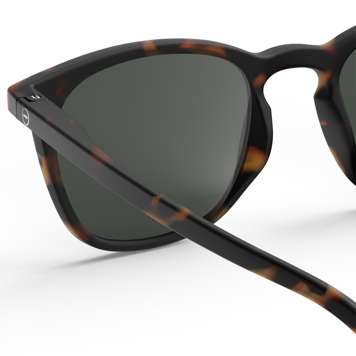 Izipizi shape e tortoise sunglasses close up of back left hand side on white background