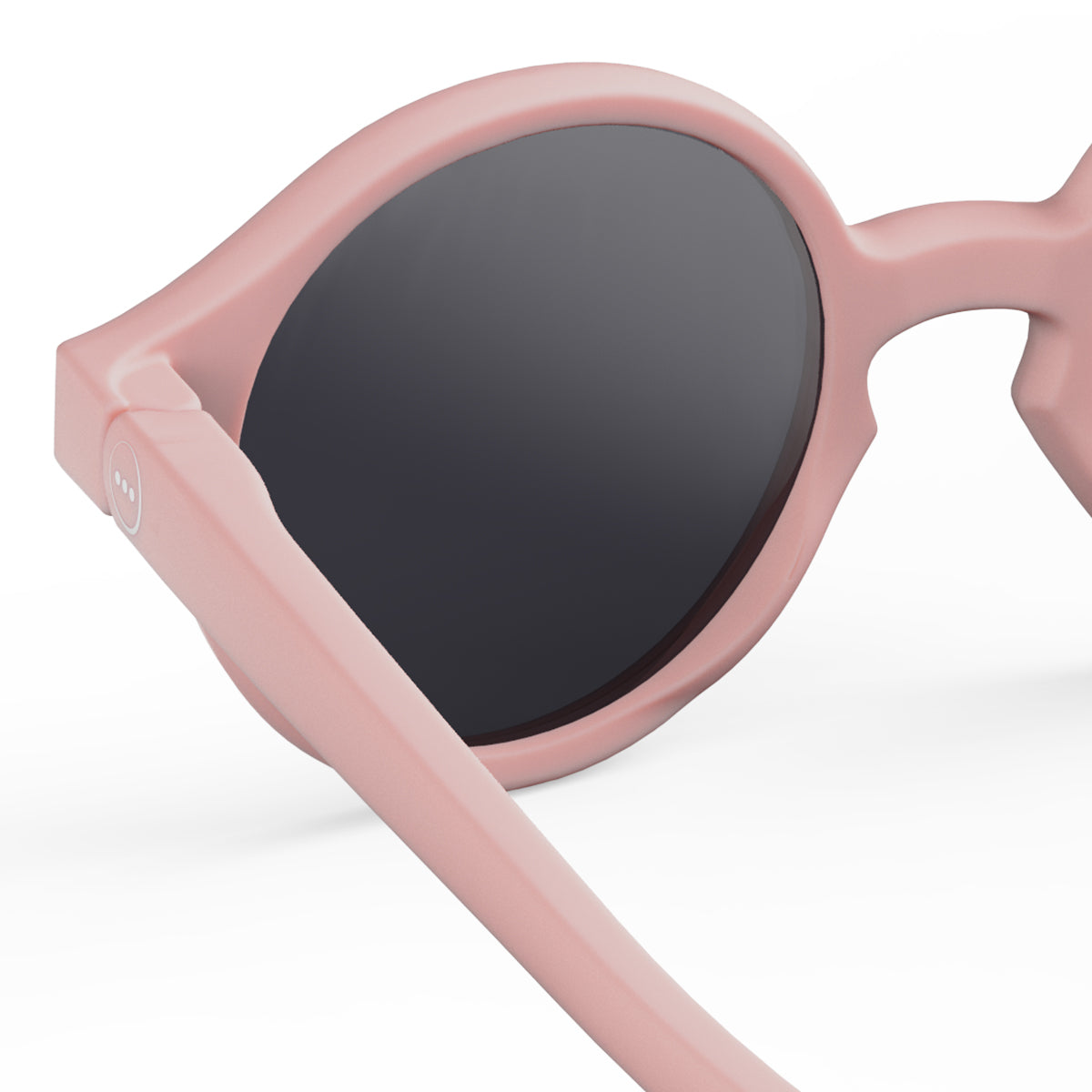 Izipizi kids sunglasses shape d pastel pinkclose up of back left hand side on white background