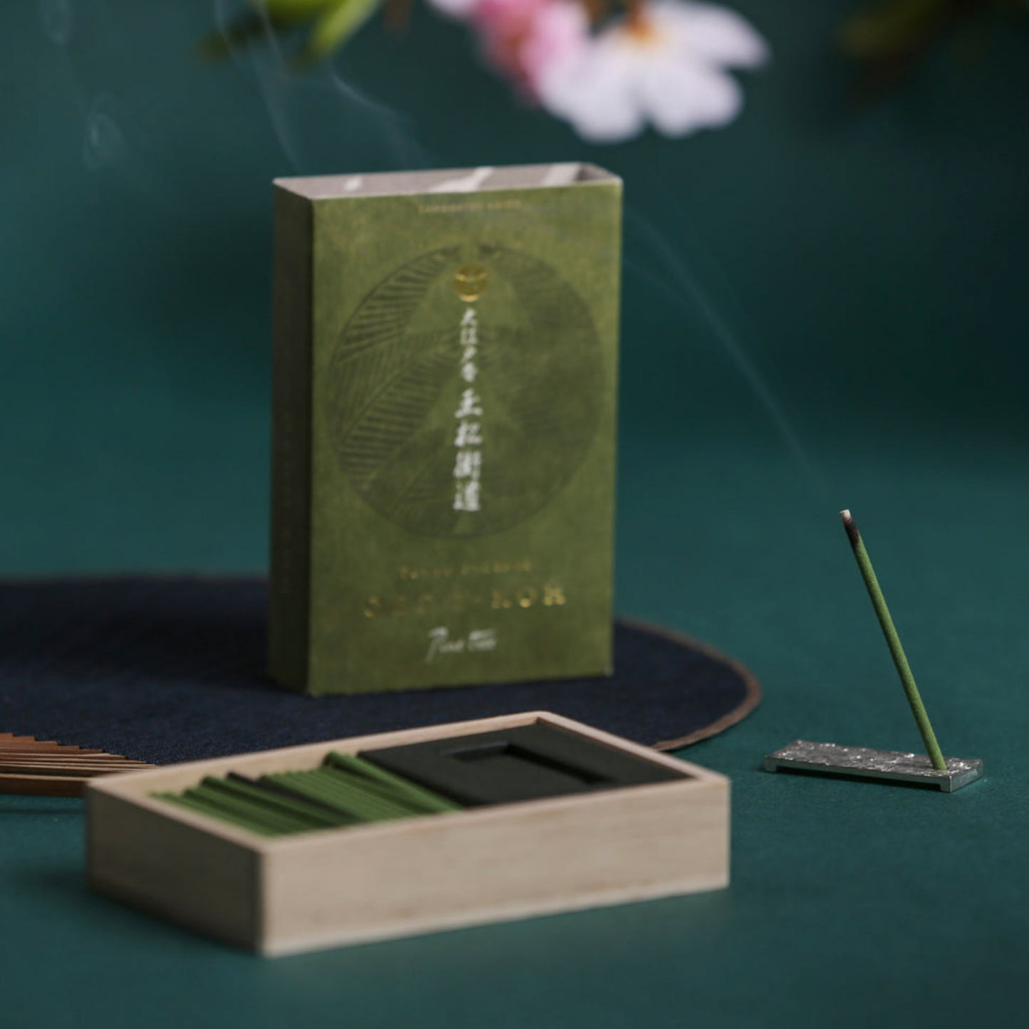 Oedo-Koh Incense Pine Tree on display burning with incence out of packaging stood in included incense stand