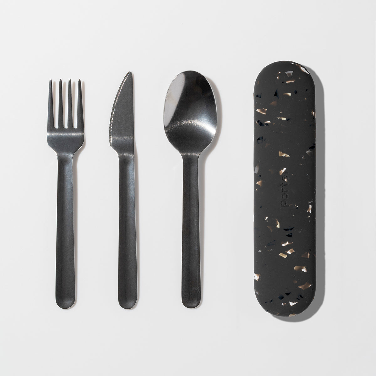 WP terrazzo charcoal stainless steel utensil set packaging lined up with fork, knife, spoon