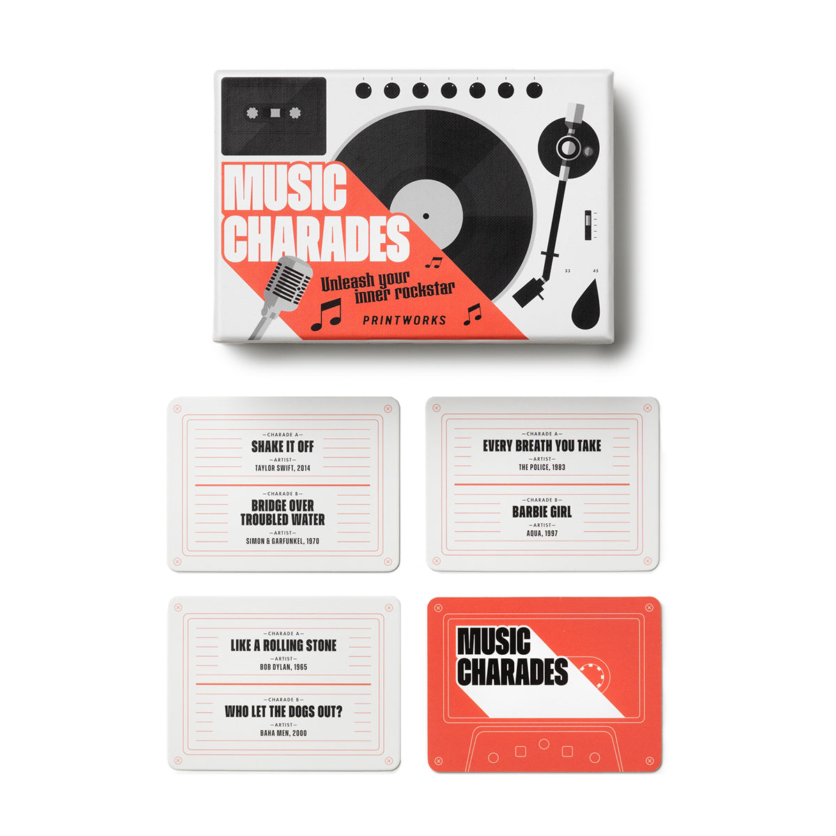 Printworks music charades card game box close up on white background with 4 cards lined up below the box
