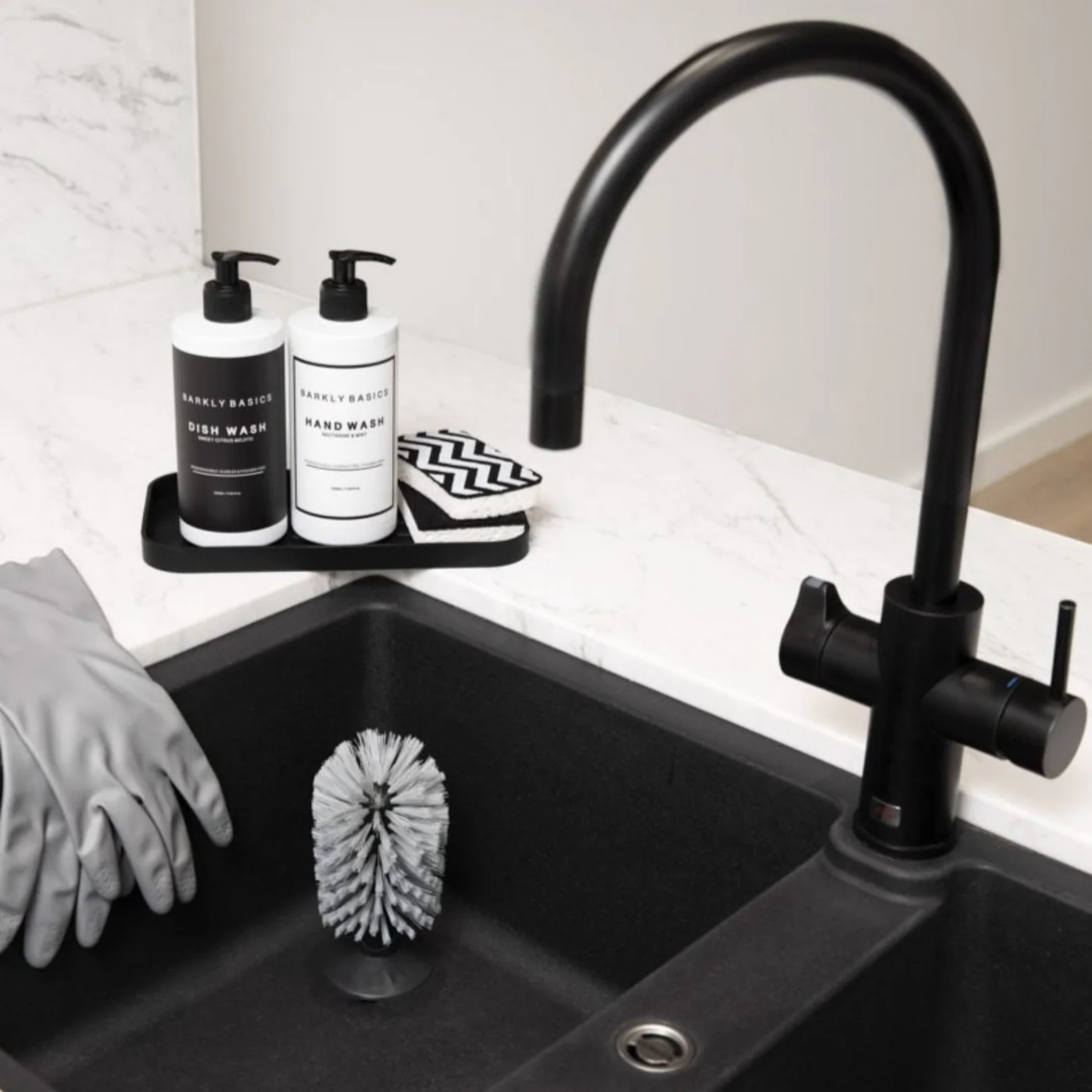 Barkly Basics hand wash front view on display with other Barkly Basics products at sink