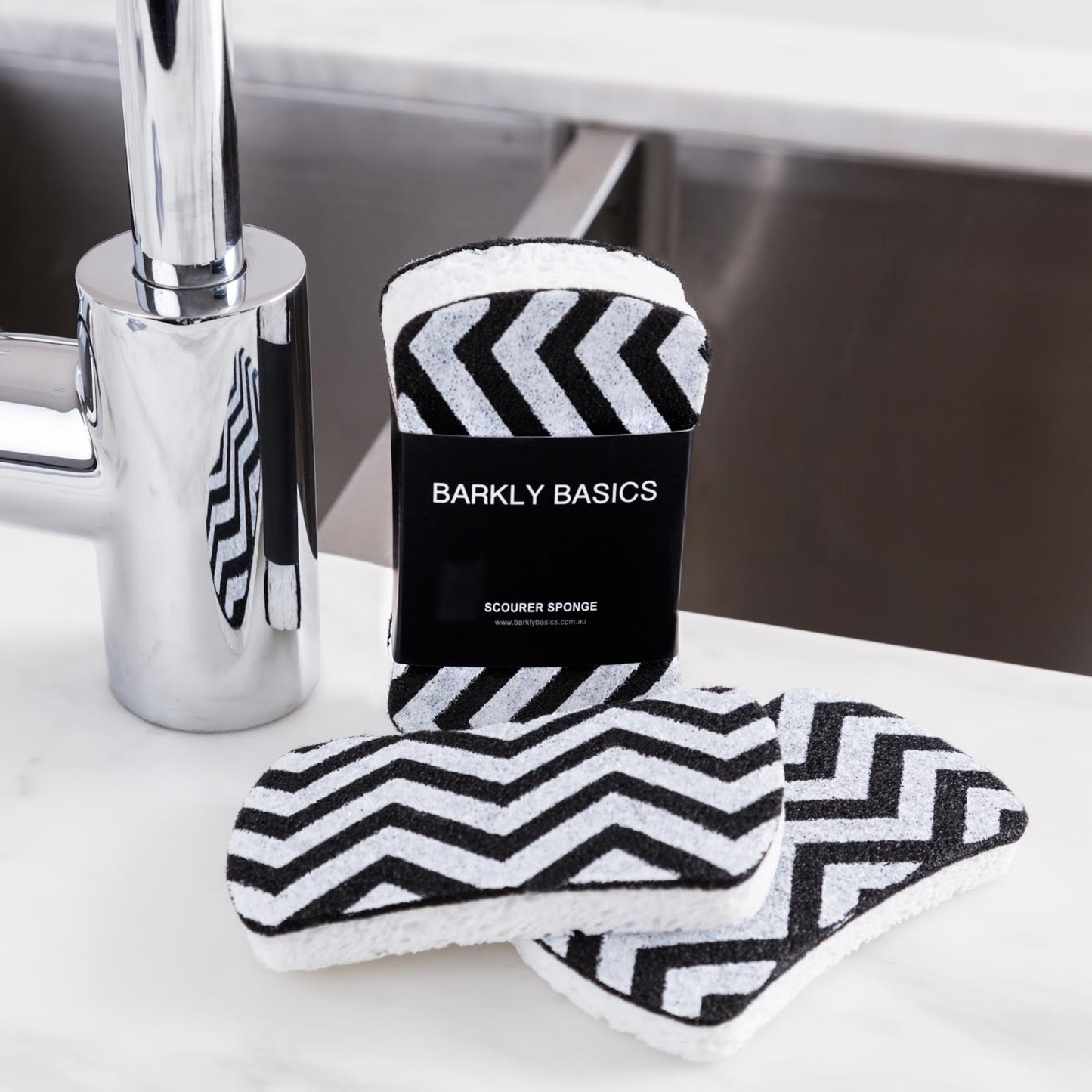 Barkly Basics scourer sponge chevron in packaging and out of packaging on display next to sink