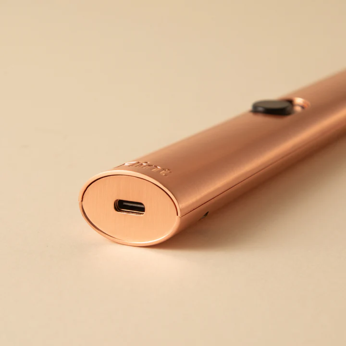 Upclose charger port view in the bottom of Flint Rechargeable Lighter - Silver zinc alloy USB-C electric lighter with 400mAh lithium-ion battery - Eco-friendly flameless lighter for candles, incense, gas stoves, and barbecues - LED battery indicator, 2-hour charge time, durable and reusable design