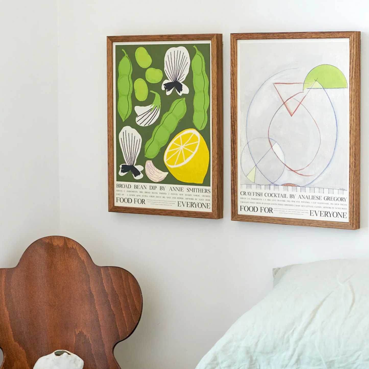 Food For Everyone Broad Bean Dip artwork A2 front view in frameb hanging next to bed