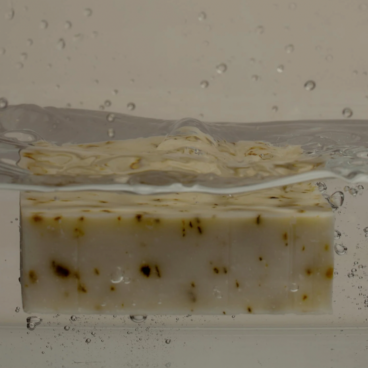 Herb Remedy botanical soap bar Peppermint submerged in water