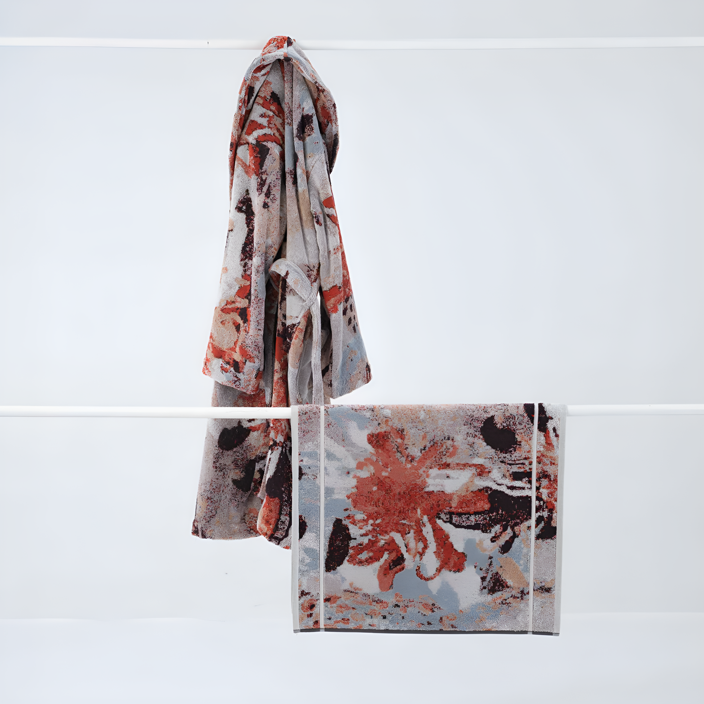 Showing the Innate Ilford robe and the Innate Ilford bath mat 60 x 100 cm, luxury absorbent terry cotton bath mat in multi-coloured Waratah jacquard design, thick and dense with intricate organic patterns, made from 100% OEKO-TEX certified cotton and responsibly woven in Portugal.