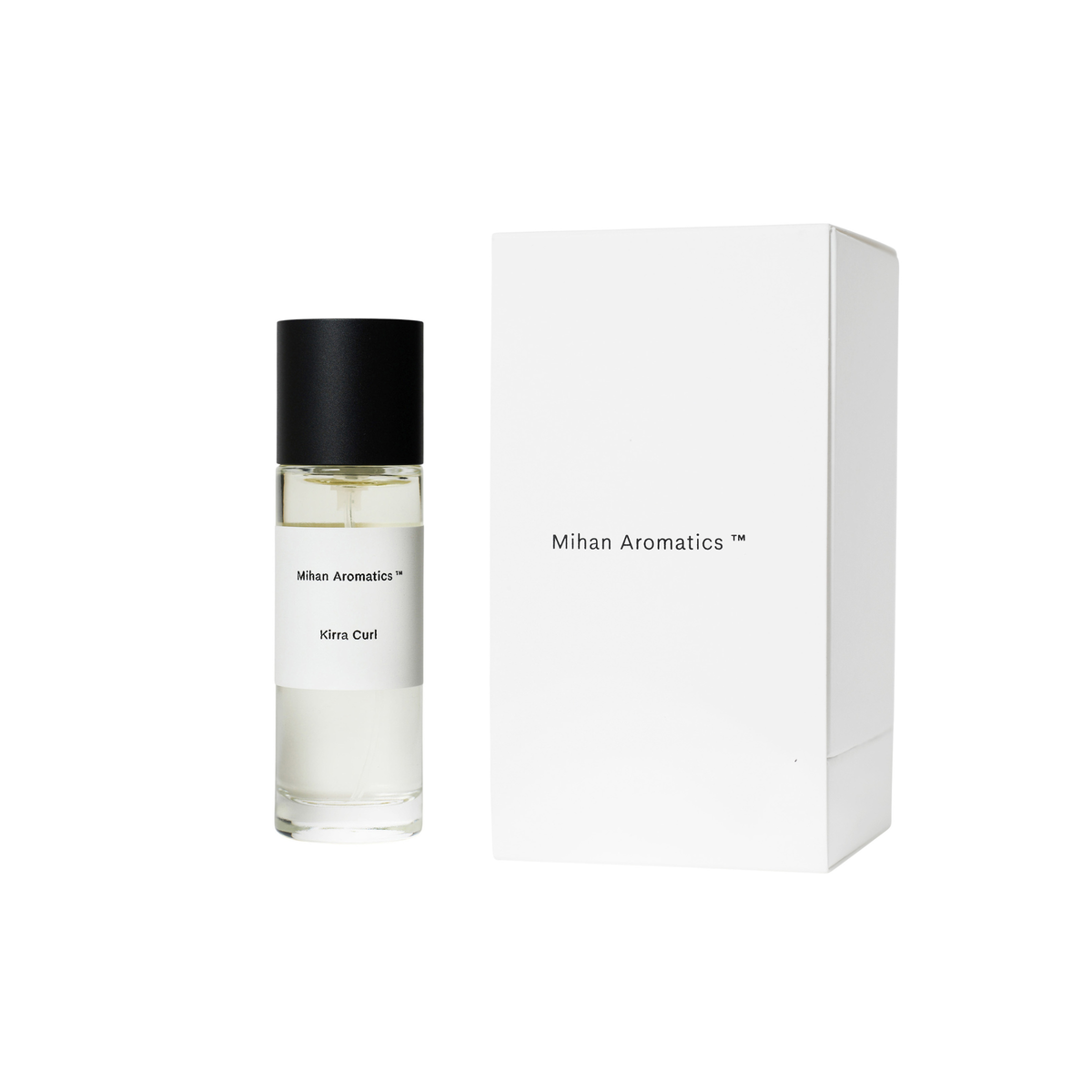 Shown with a packaging Mihan Aromatics Kirra Curl Parfum in clear glass bottle, 30ml, woody amber scent blending sea salt, lemon rind, leather, surf wax, and Australian sandalwood. Inspired by sun-soaked surf days along the Australian coast. Hand-filled in Melbourne, cruelty-free and vegan, with 30% perfume concentrate for lasting fragrance.