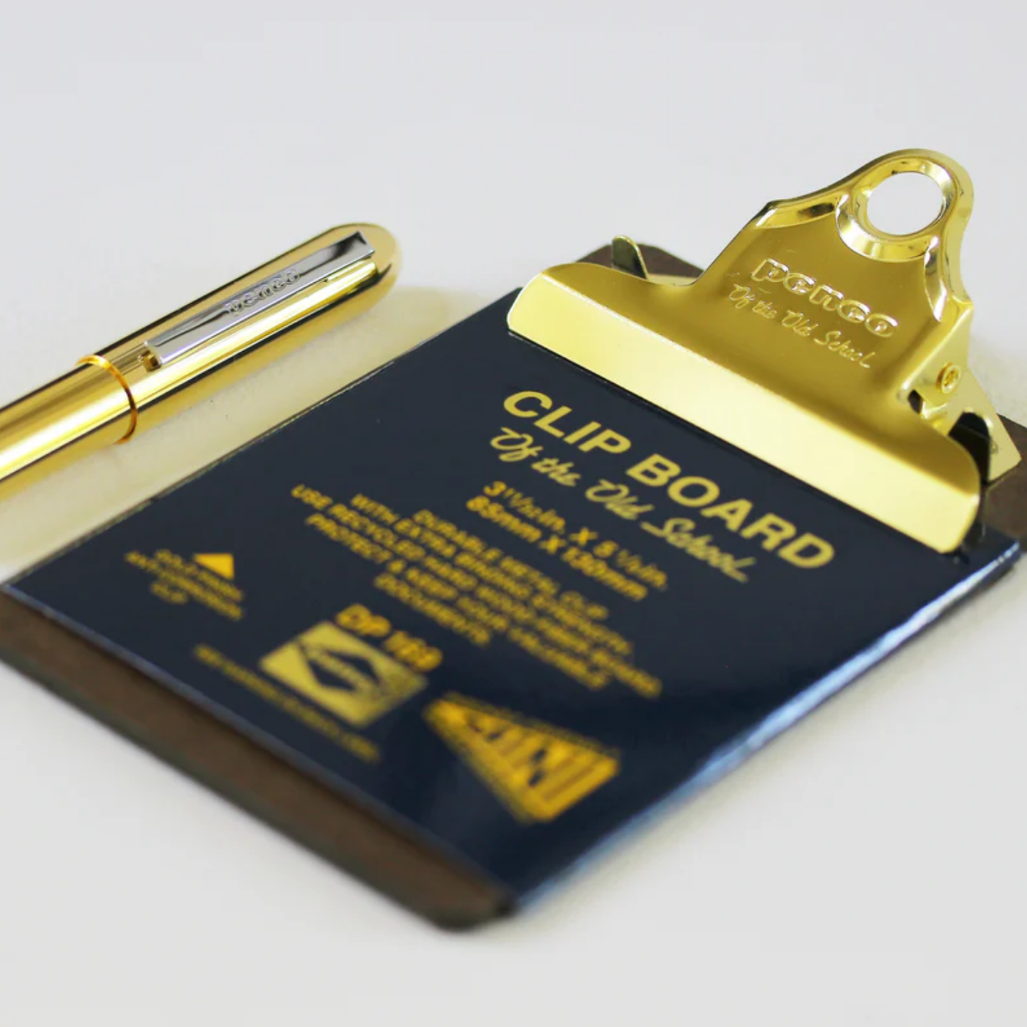 Close up of Penco mini clipboard next to mini ballpoint pen