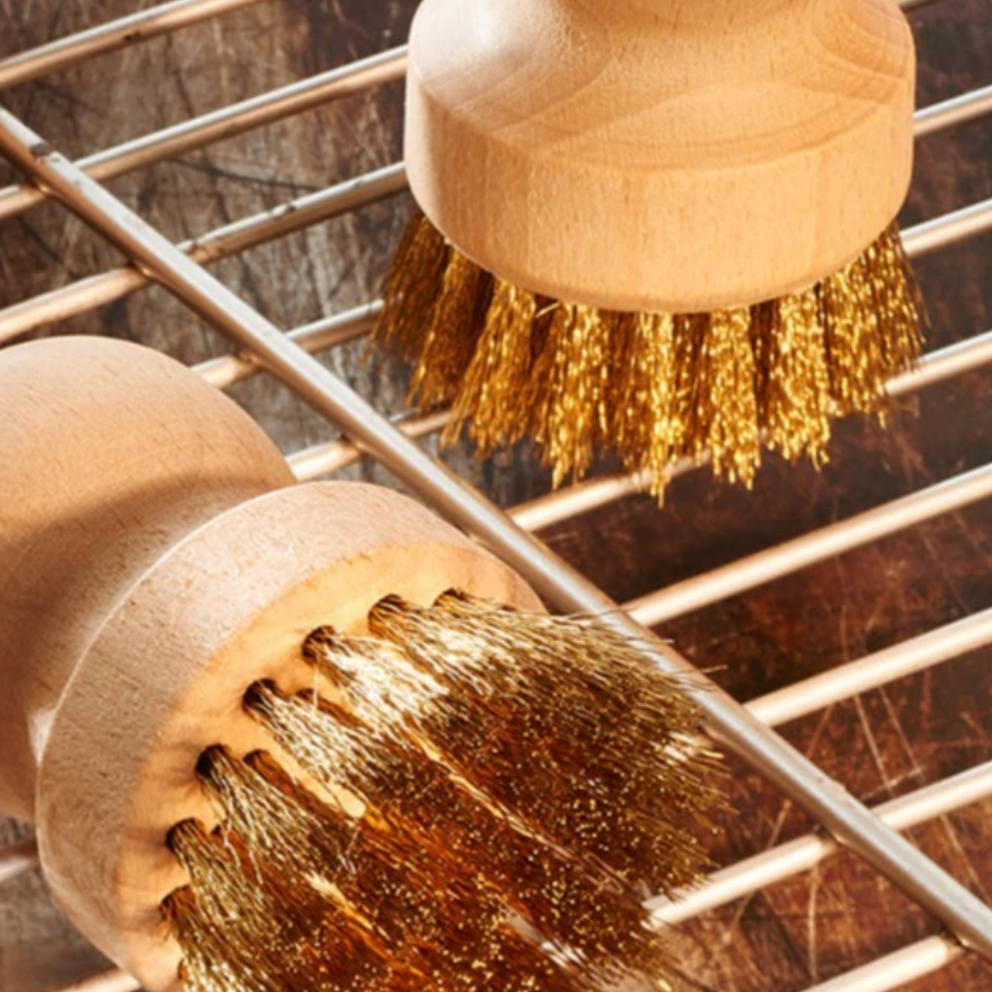 Redecker bbq brush with beech handle on bbq grill