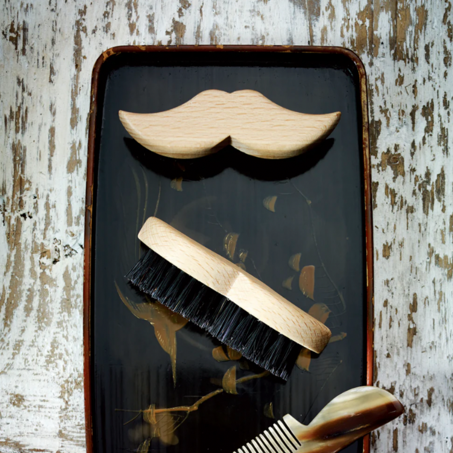 Redecker beech moustache beard brushes on tray with comb.