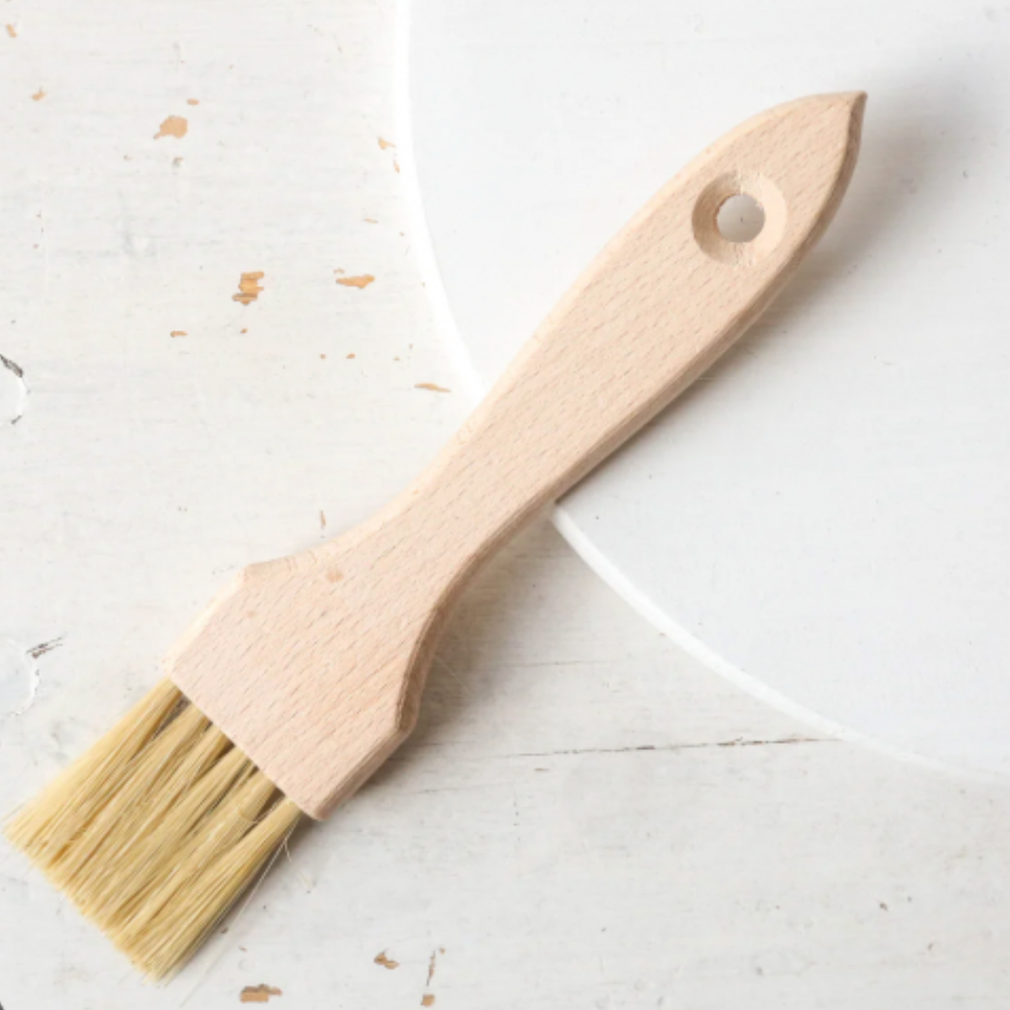 Redecker pastry brush on display on wooden kitchen top