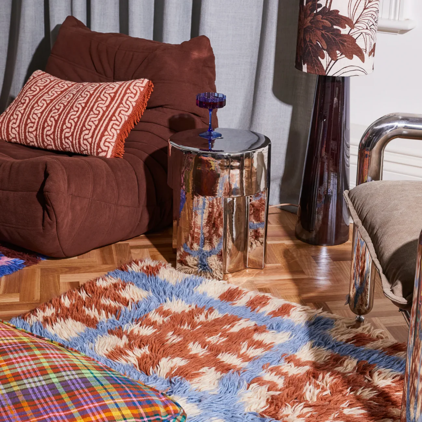 Sage & Clare Fidel Punch Needle Cushion on couch in living room