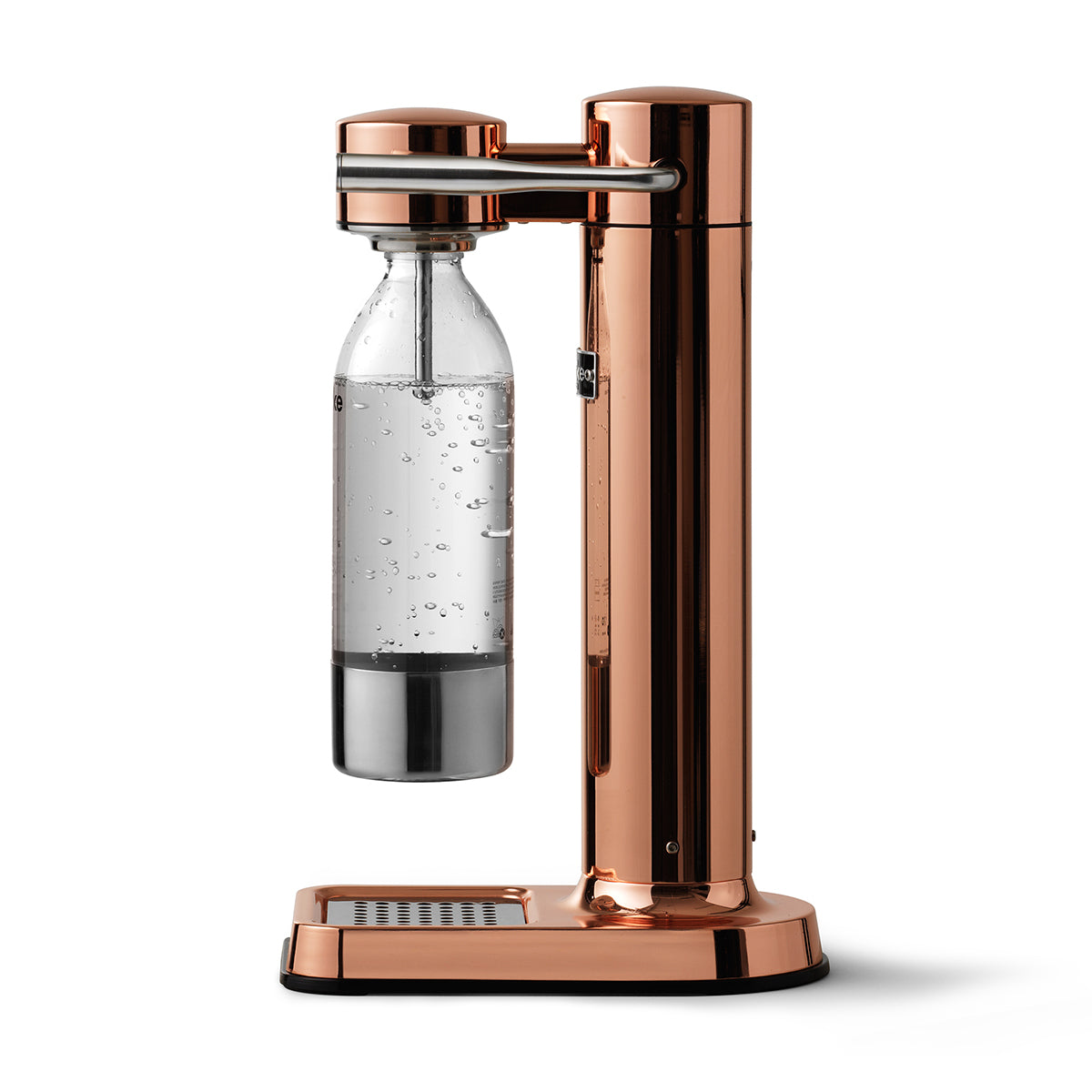 Side view of the stylish sparkling water maker designed by Aarke in Sweden showing the copper finish and the included 650ml PET water bottle in use