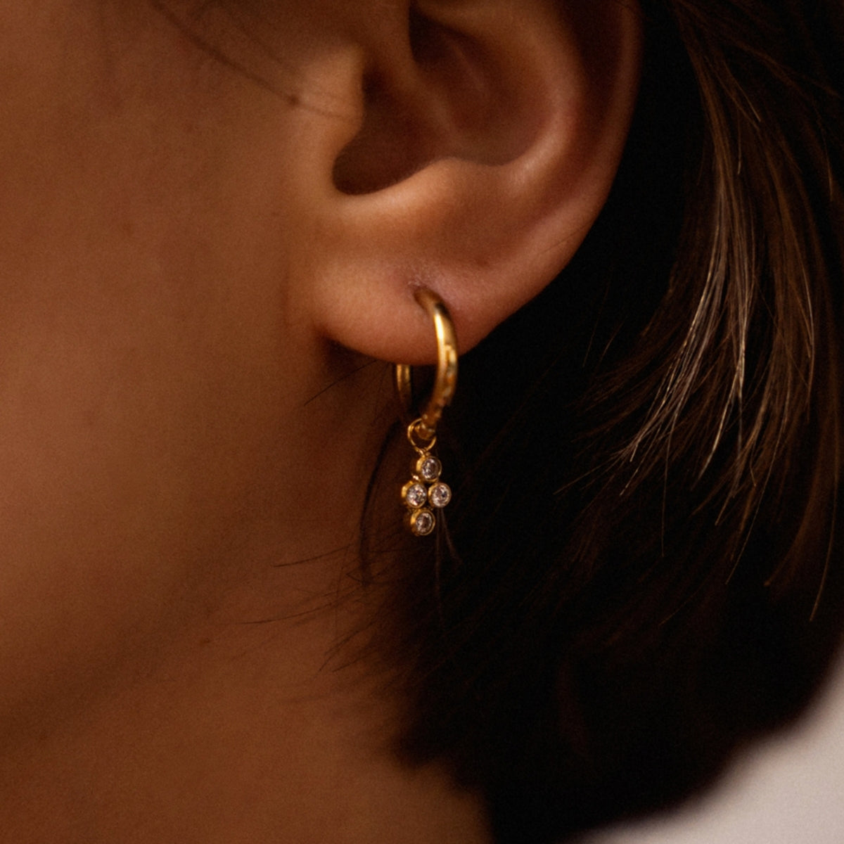 Close up of woman wearing AEC Paris Bendis teardrop white-zirconium oxide earings 