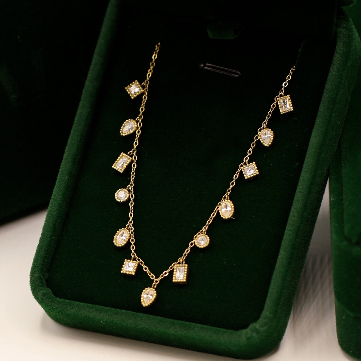 AEC Paris Mohandas white zirconium oxide necklace in green velvet box
