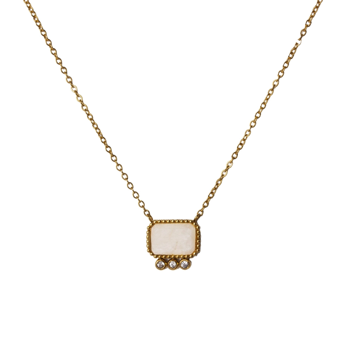 Upclose with the pendant from AEC Paris Thetis Moonstone necklace - gold chain necklace featuring a luminous moonstone baguette gemstone pendant, 14k gold-plated stainless-steel material, durable hypoallergenic everyday jewellery promoting emotional balance.