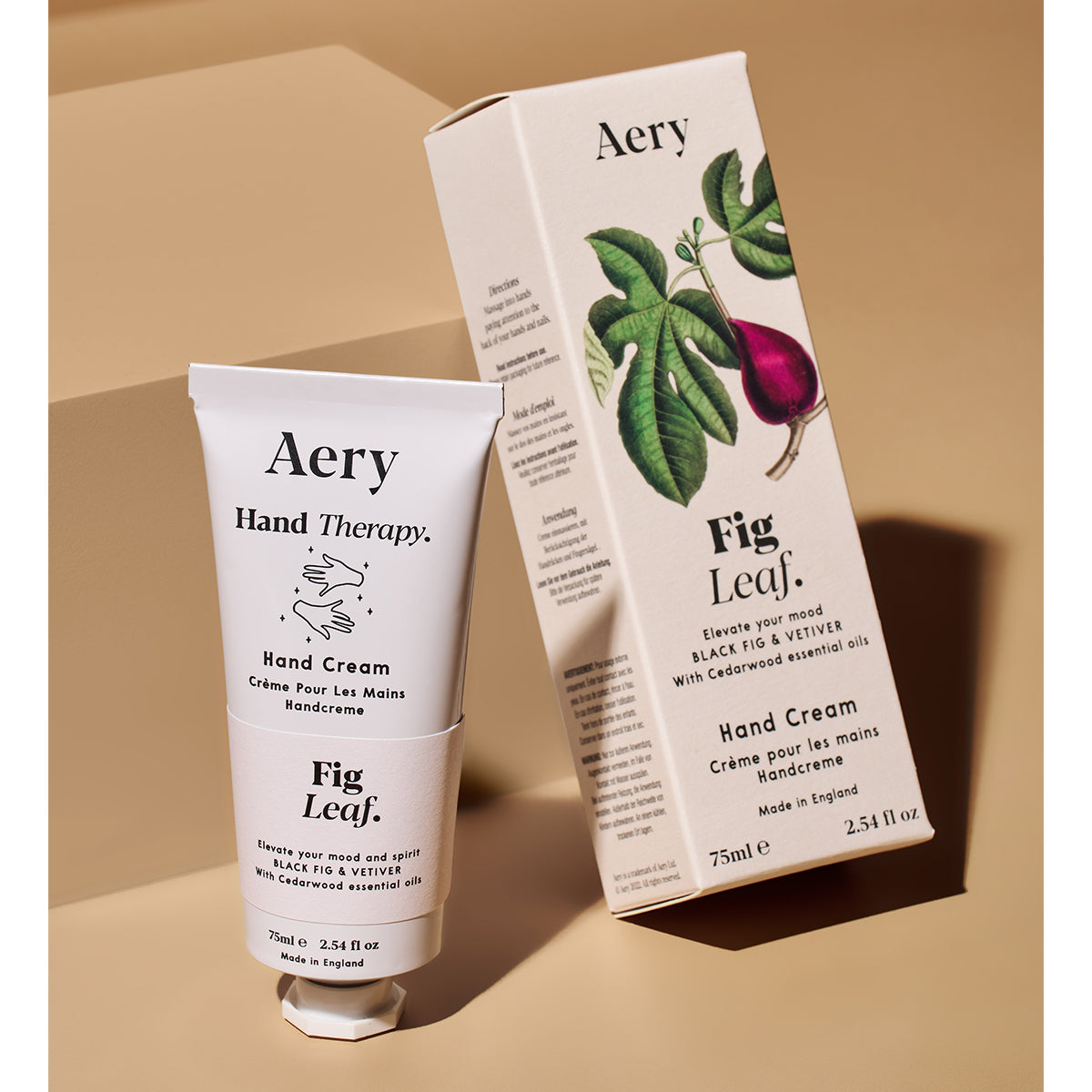 Aery 75ml Fig Leaf hand cream from the Botanical collection showing hand cream and packaging on a beige background