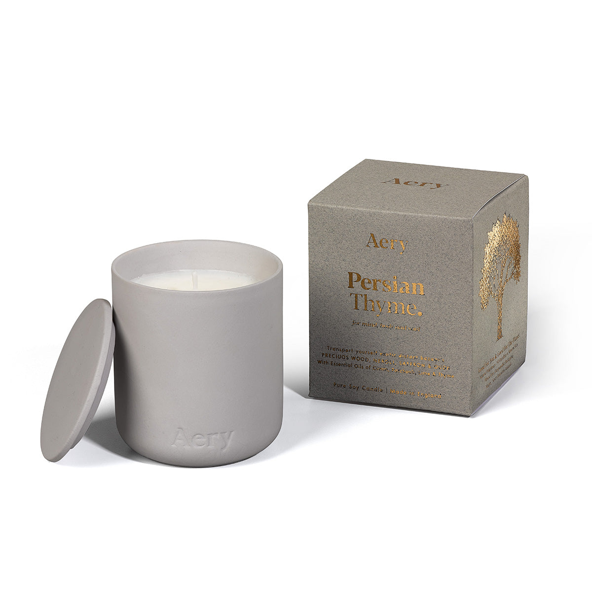 Aery Persian Thyme 280gm candle with lid from the Fernweh collection and packaging on white backgrond