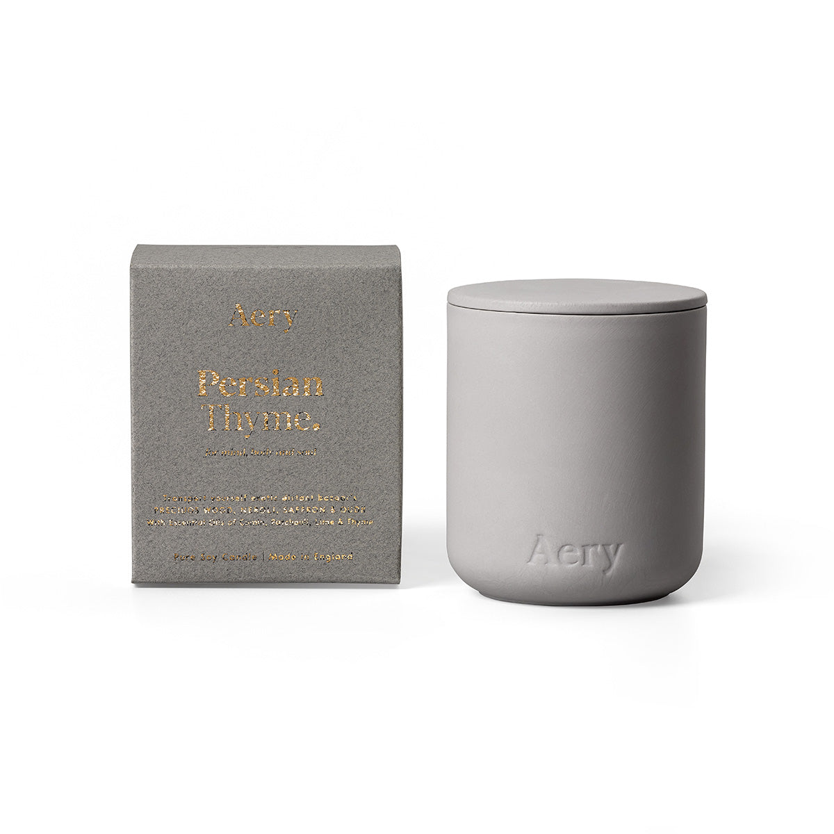 Aery Persian Thyme 280gm candle with lid from the Fernweh collection and packaging on white backgrond