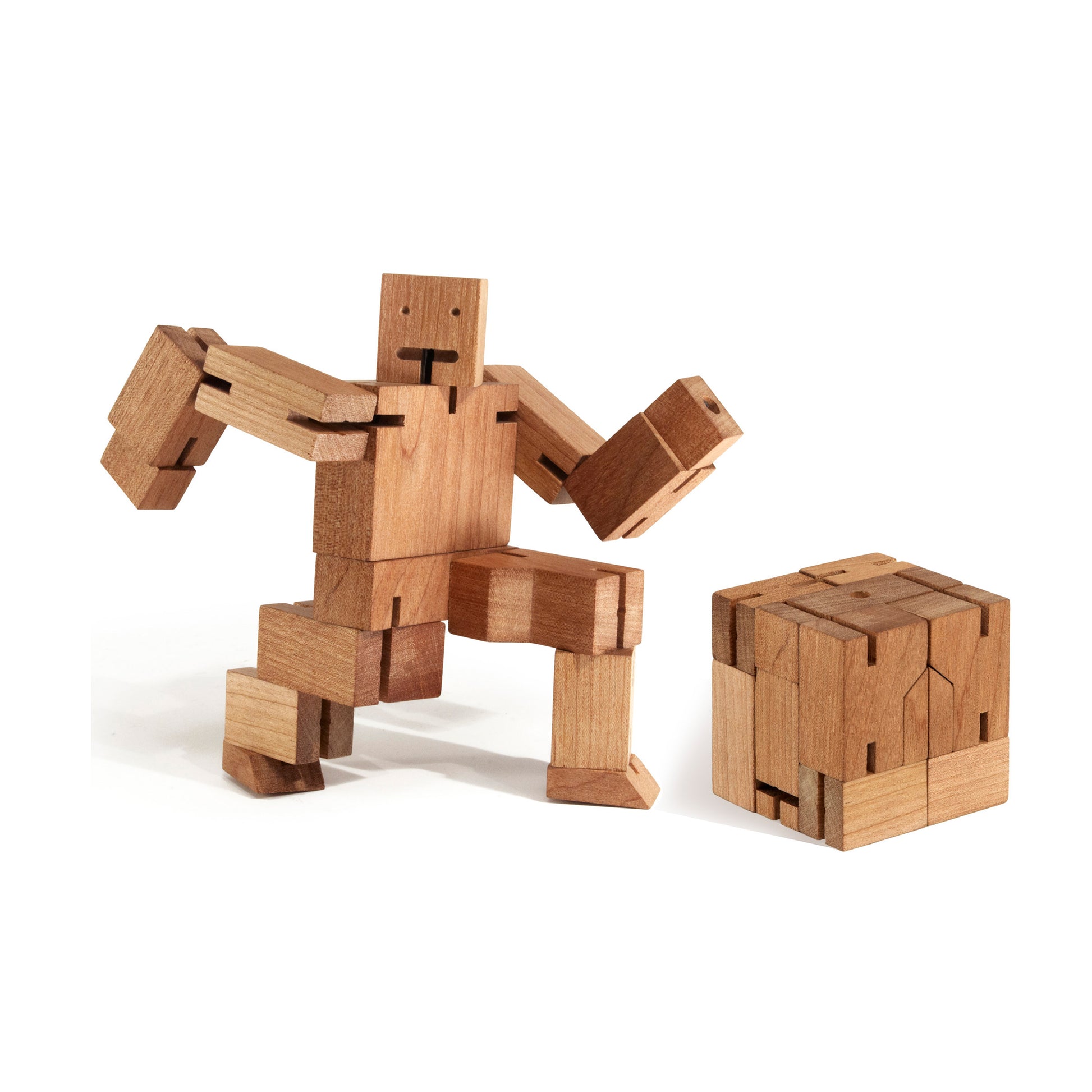 Showing its cube and robot form from two Areaware Cubebot Small wooden toy robot - natural beech-wood figure with elastic joints, folds into a 1.5-inch cube and poses in multiple positions; compact, durable, and suitable for ages 4+.