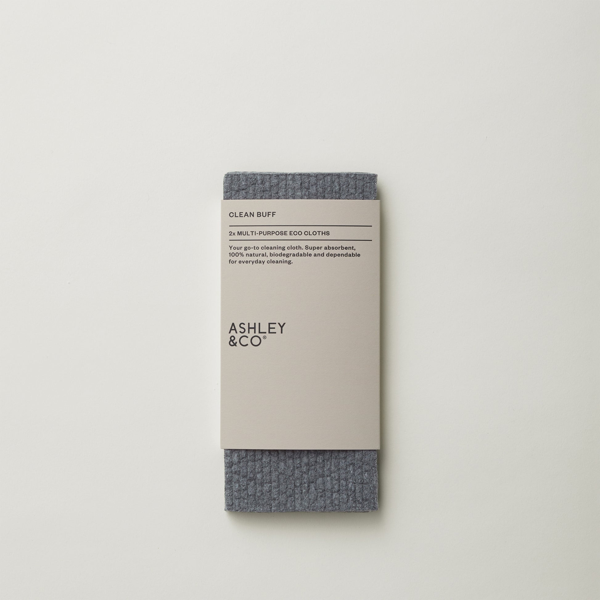 Ashley and Co 'Clean Buff' multipurpose cloths in light grey colour shown in packaging on a grey background.