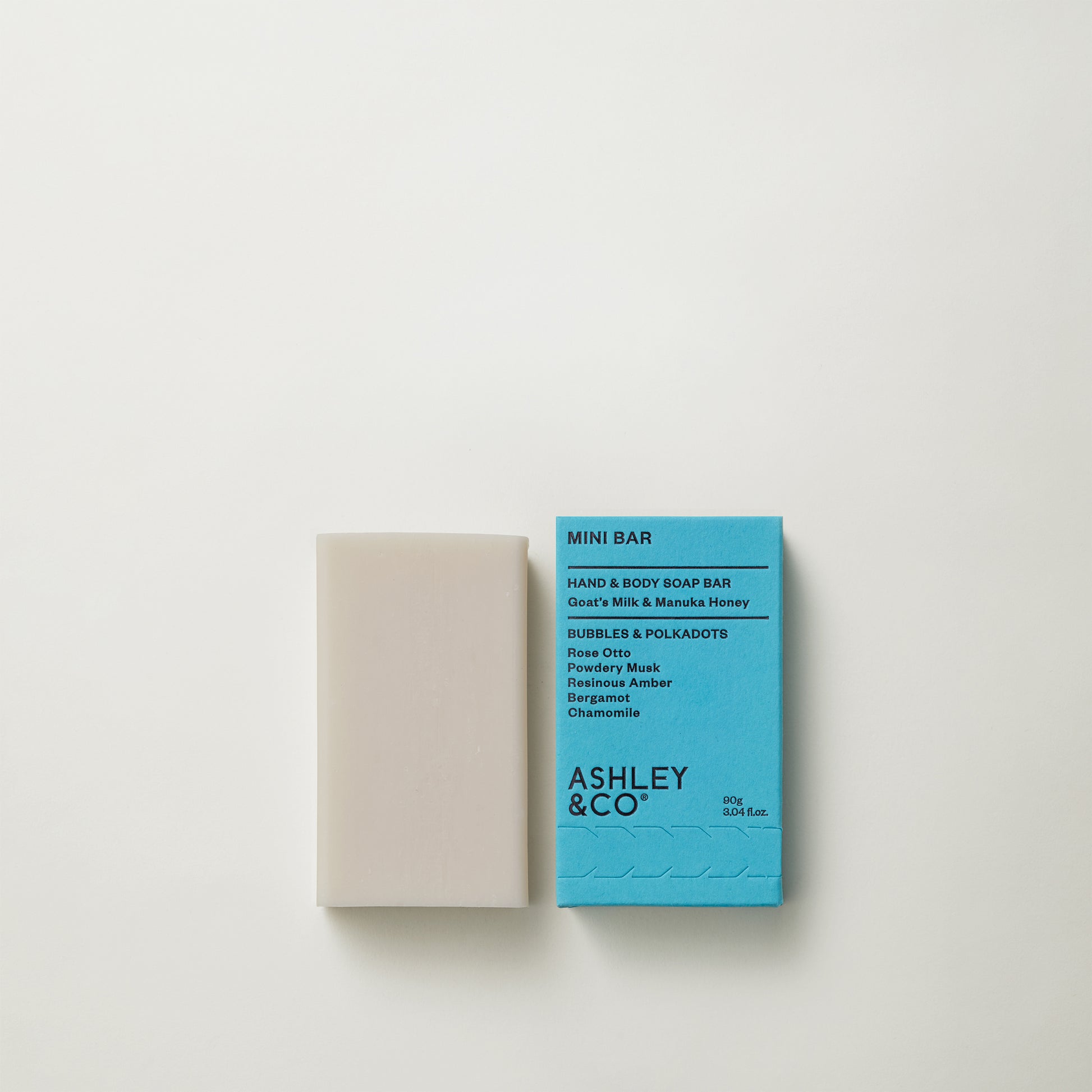 Ashley and Co 'Mini Bar' body soap in bubbles an polkadots fragrance on a grey background.