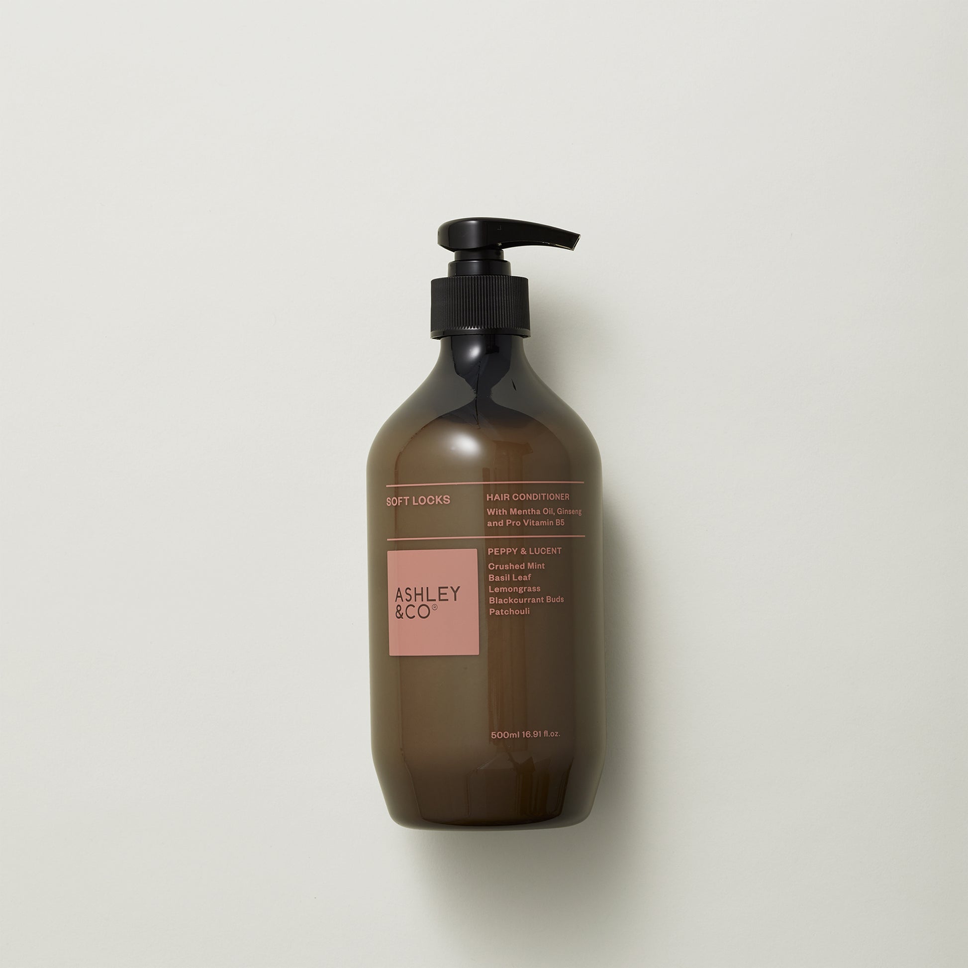 Ashley and Co "Soft Locks' hair conditioner in Peppy and Lucent scent. on a grey background.