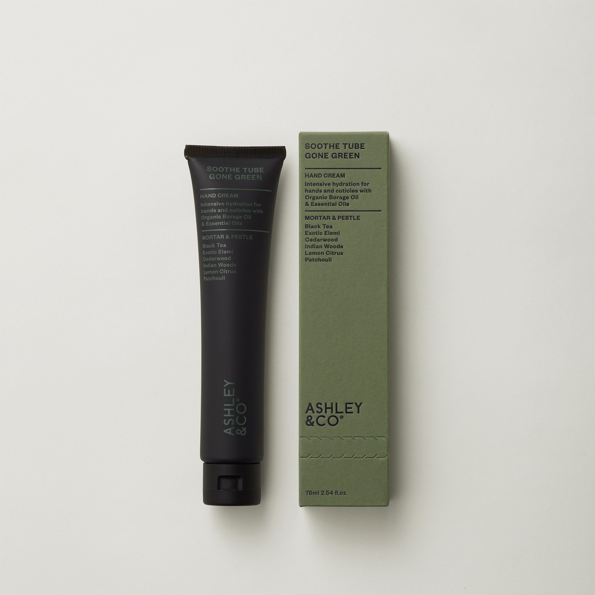 Ashley and Co 'Soothe Tube Gone Green' handcream in mortar and pestle fragrance on a grey background.