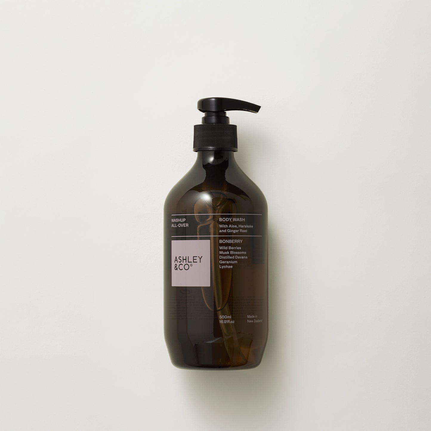 Ashley and Co 'Washup All Over' body wash in bonberry fragrance on a grey background.