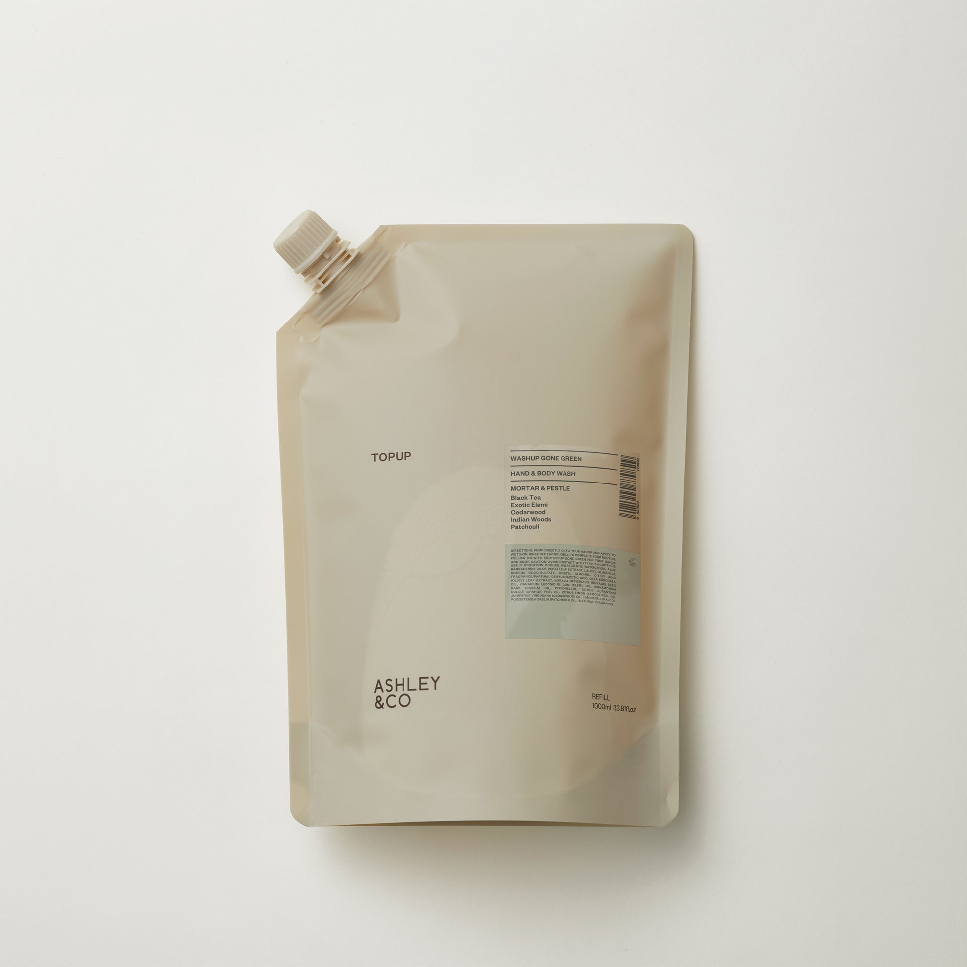 Ashley and Co 'Washup Gone Green' hand and body wash top up sachet in mortar and pestle fragrance on grey background.