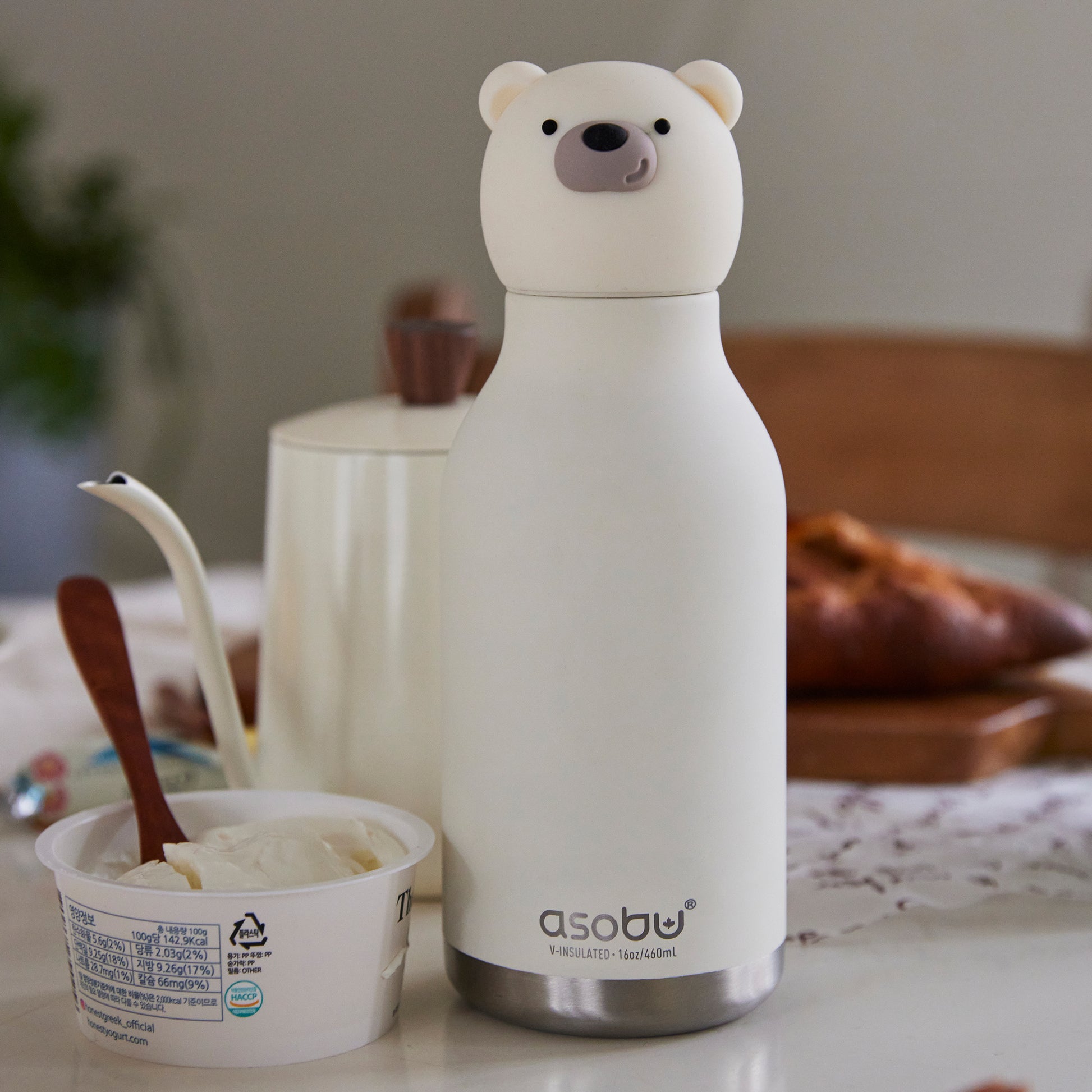 Polar Bear Bestie water Bottle placed next to breakfast items.