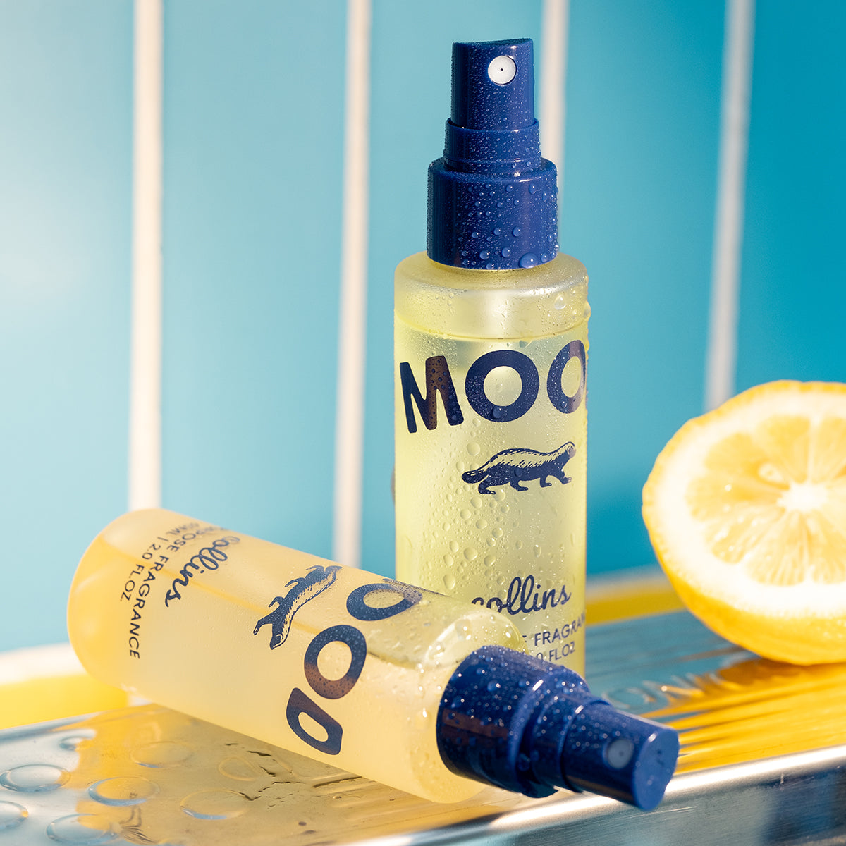 Close up shot of 2 bottles of travel sized bottle of yuzu scented mood water by collins,