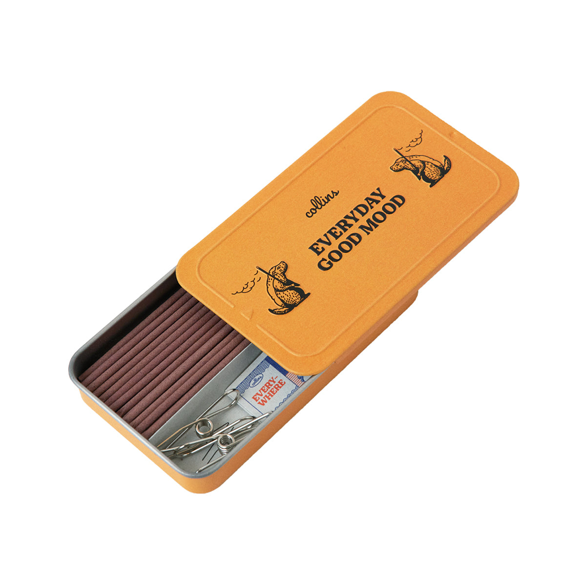 Collins 'Fluffy Pillow' natural incense sticks in open metal tin on white background