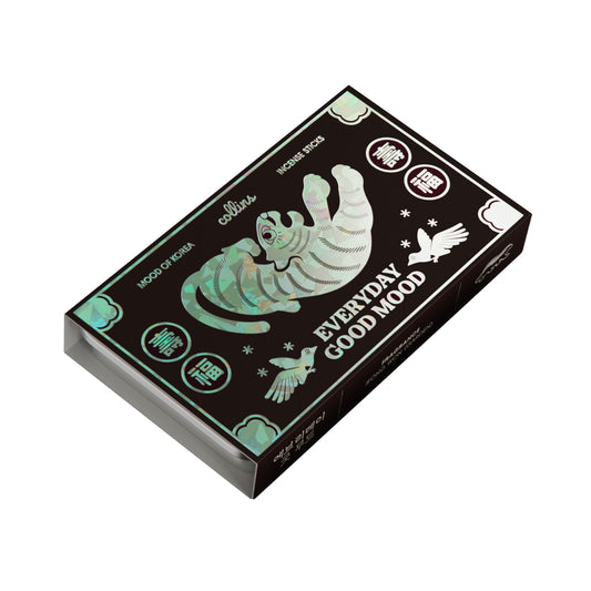 A tin of Collins natural incense sticks in korea edition scent, in its packaging, overhead shot.