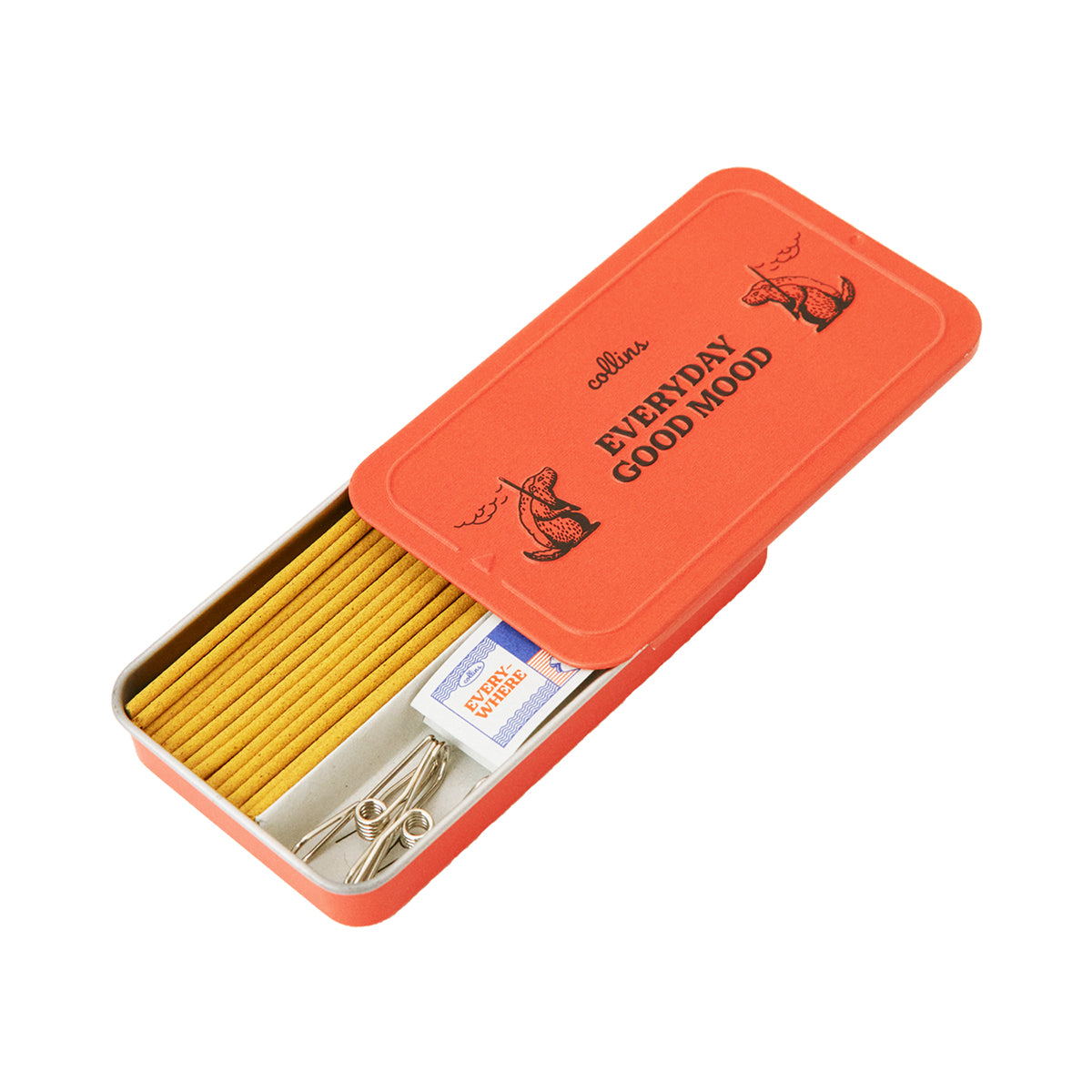 Collins 'Welcome Drink' natural incense sticks in open metal tin on white background
