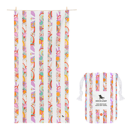 Dock and Bay kids pink power M beach towel open and hanging next to canvas pouch