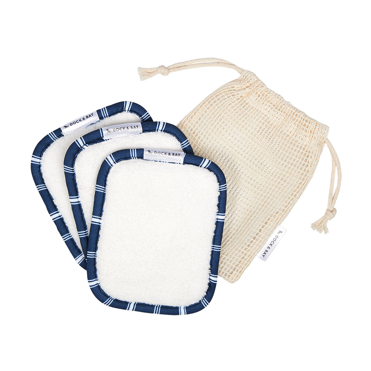 Set of 3 navy dock and bay makeup wipes laying flat on beige mesh bag on a white background