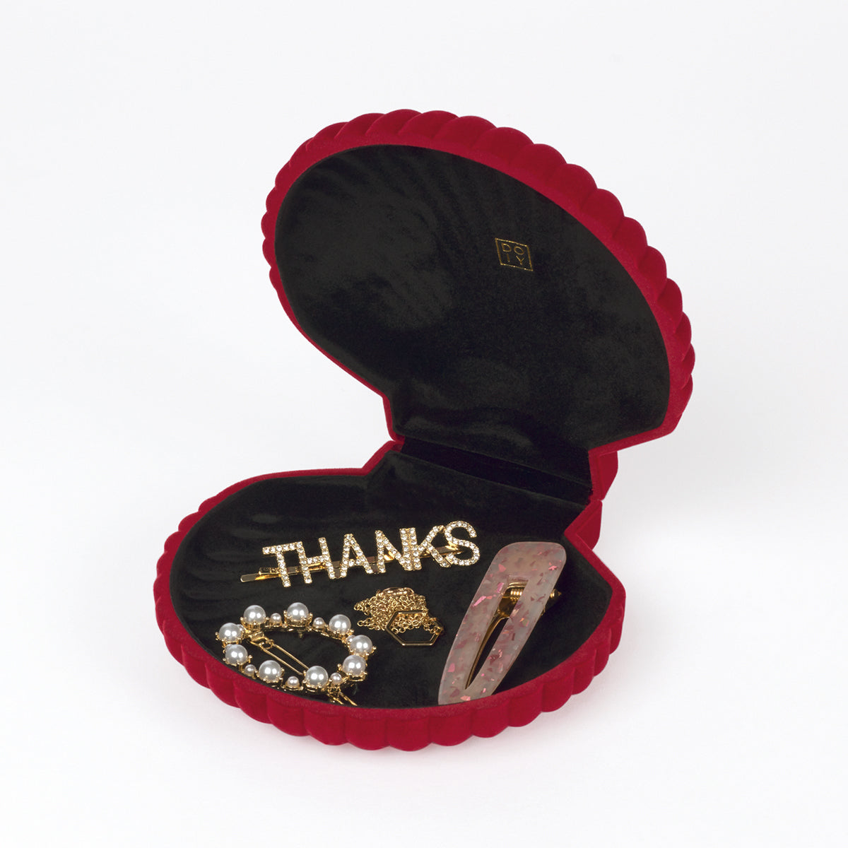 Open DOIY red velvet venus jewelry box filled with jewels on white background