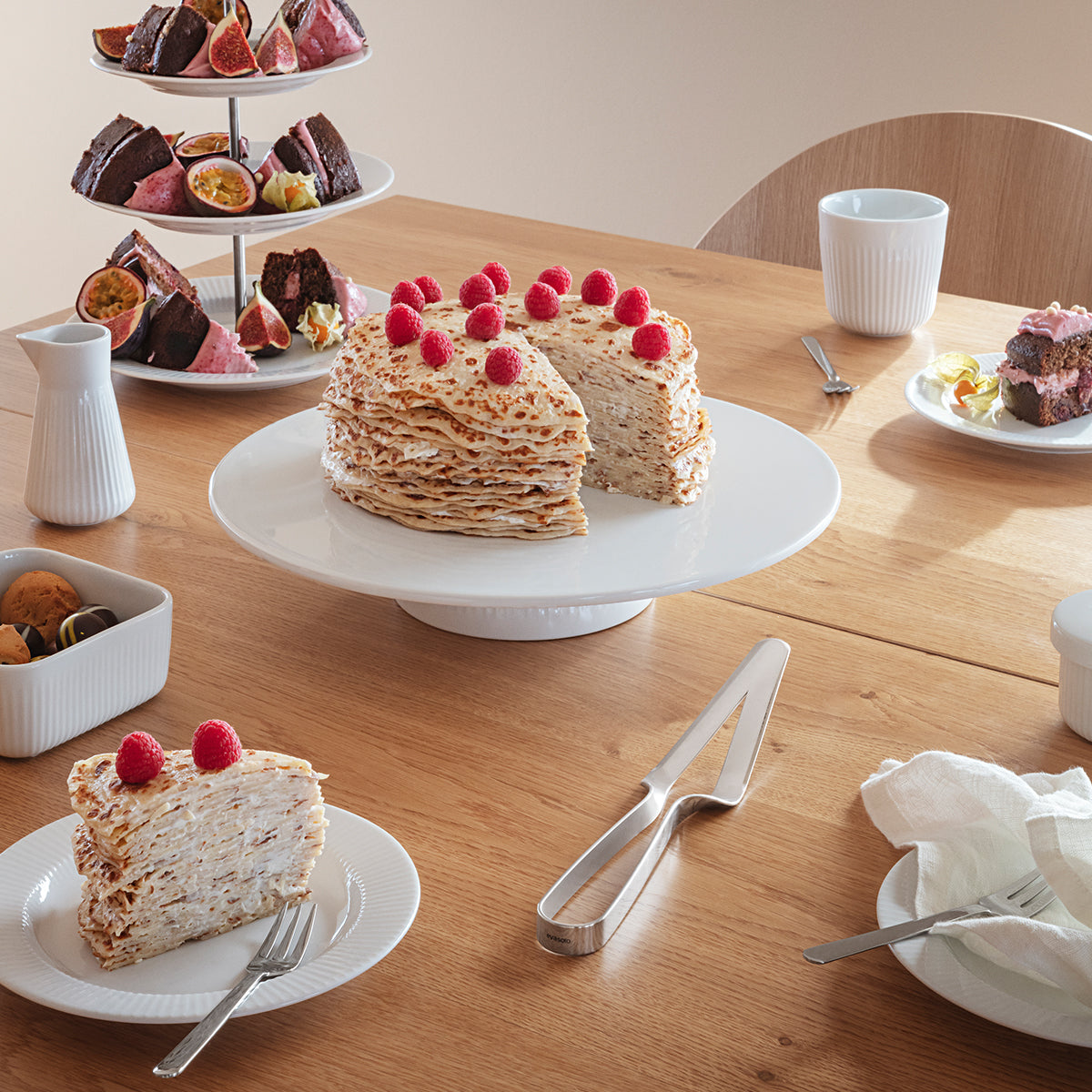 Image showing stainless steel Cake Server by Eva Solo, in a high tea setting.