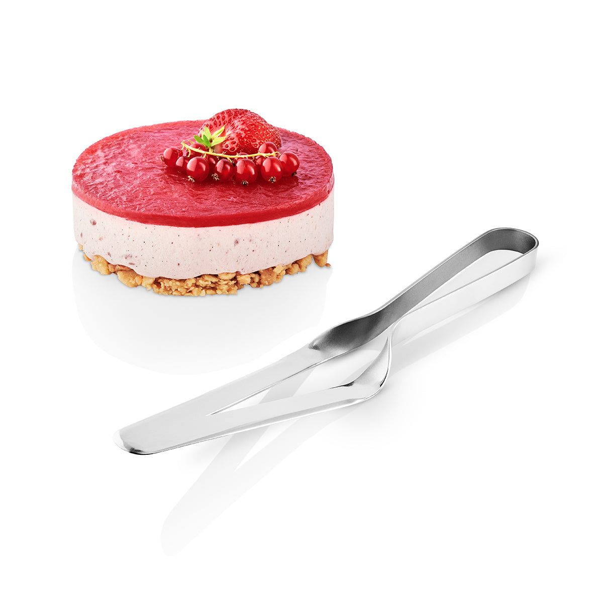 Image showing Cake Server by Eva Solo at an angle with a cake in background.