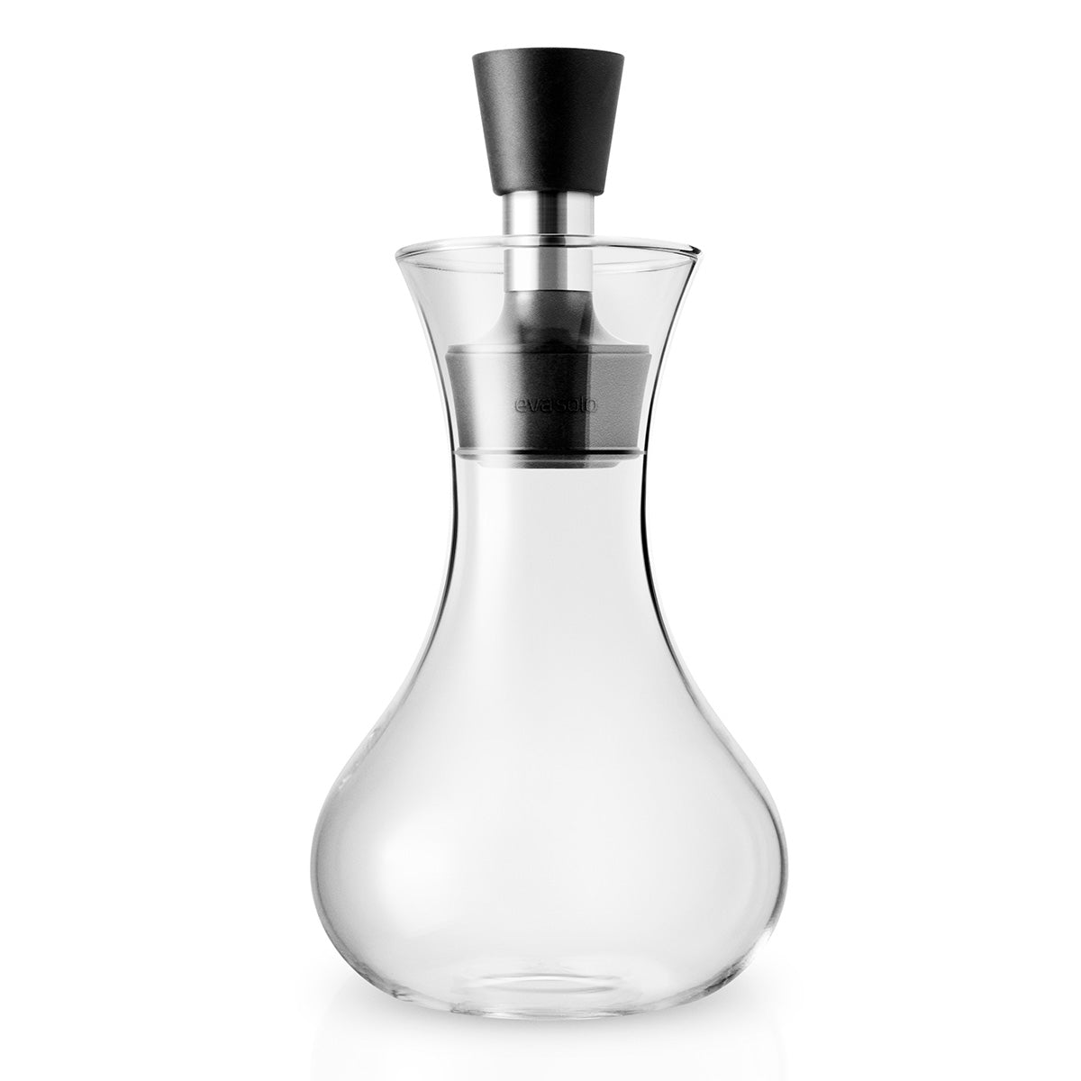 Clear bottle of Eva Solo dressing shaker - clear glass bottle; transparent food-safe container for mixing and storing salad dressings, oils, and liquid seasonings.