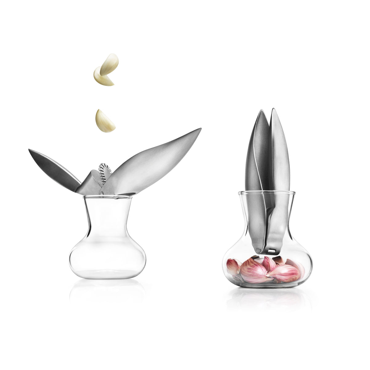 Eva Solo garlic press - stainless steel presser on a bottle with integrated garlic-crushing feature, sleek metal construction for easy food prep.