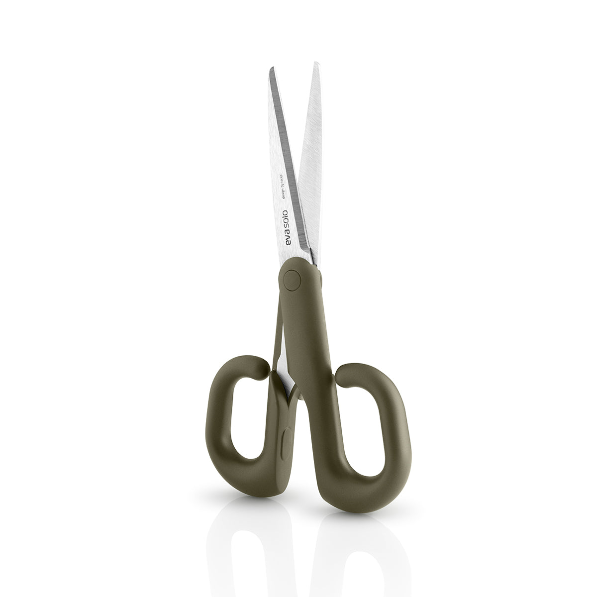 Green tool scissors by eva solo standing upright & open on its handle.