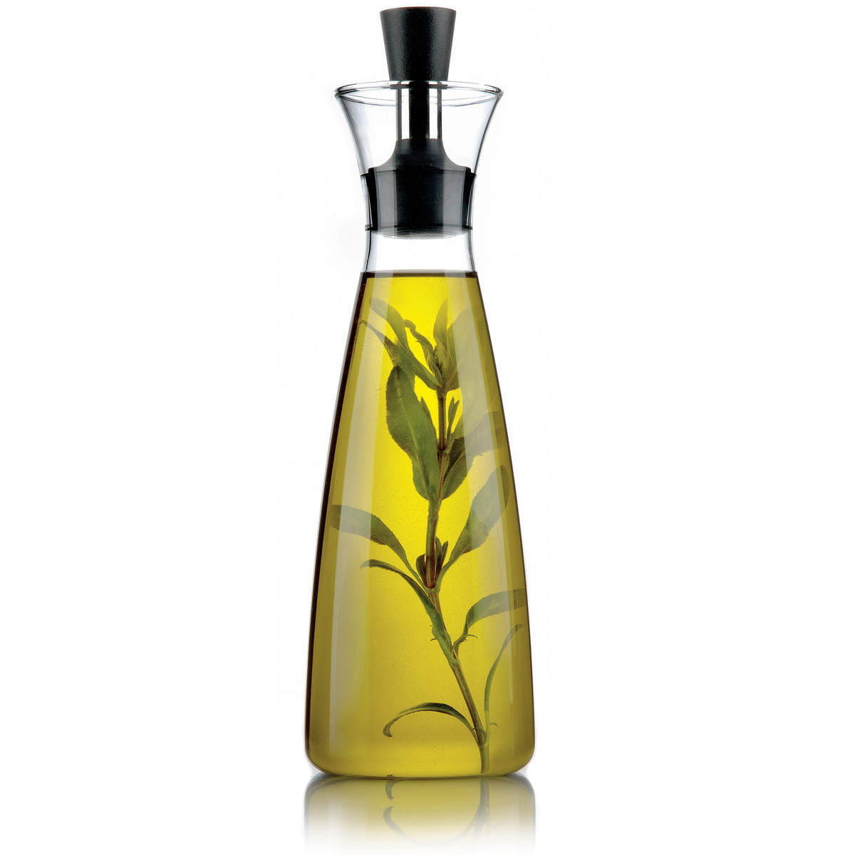 Oil & Vinegar carafe by Eva Solo filled with herb infused oil.