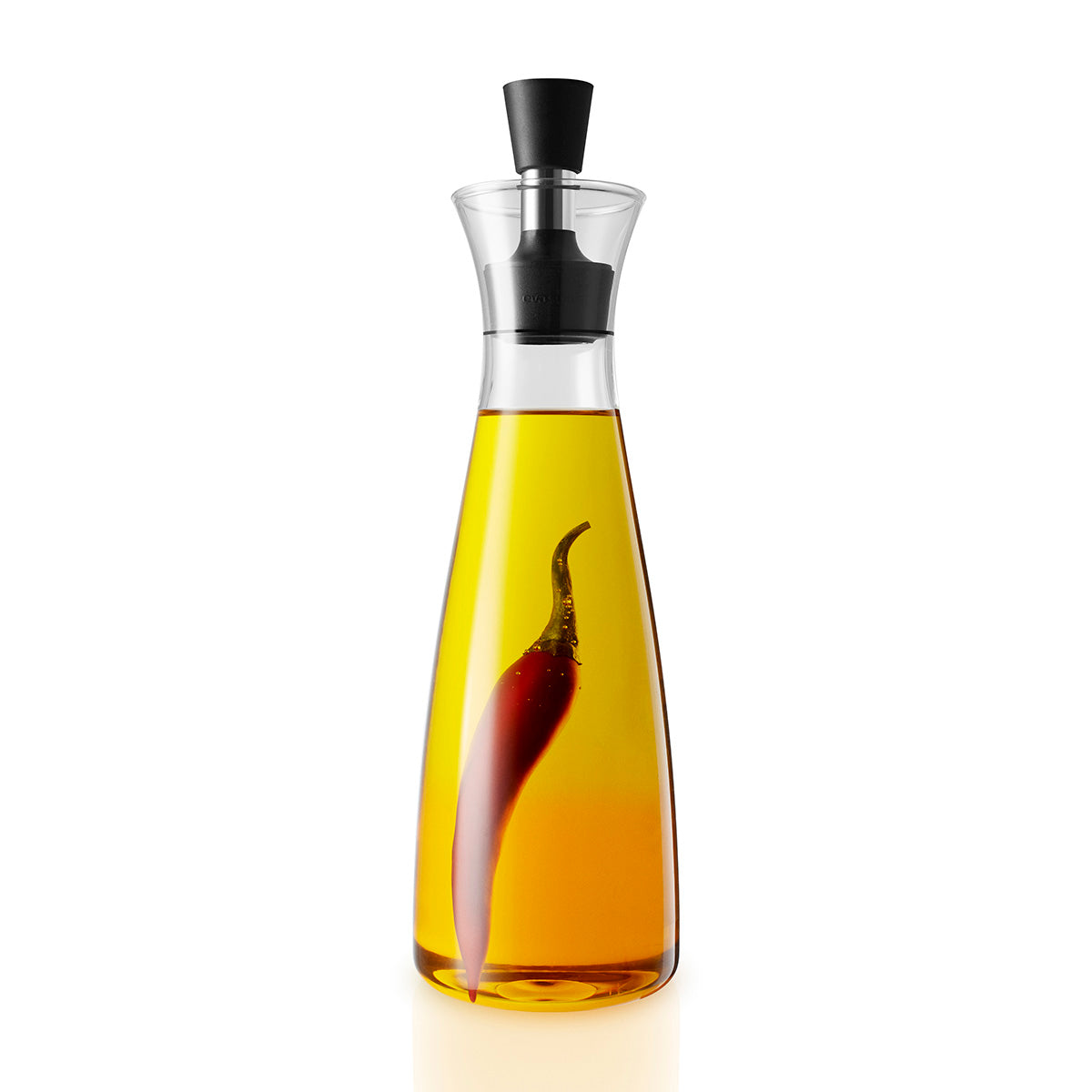 Oil & Vinegar carafe by Eva Solo filled with chilli infused oil.