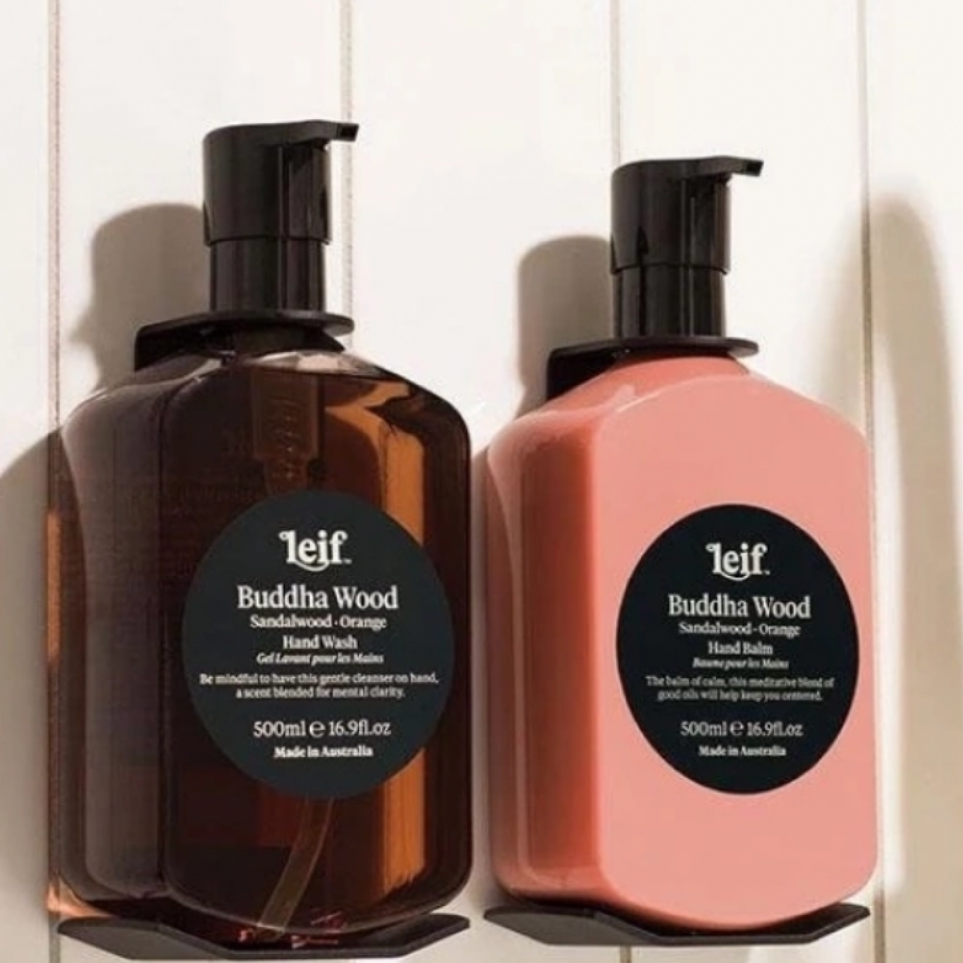 Leif hand balm and hand wash 500ml Buddah Wood in bathroom side by side 