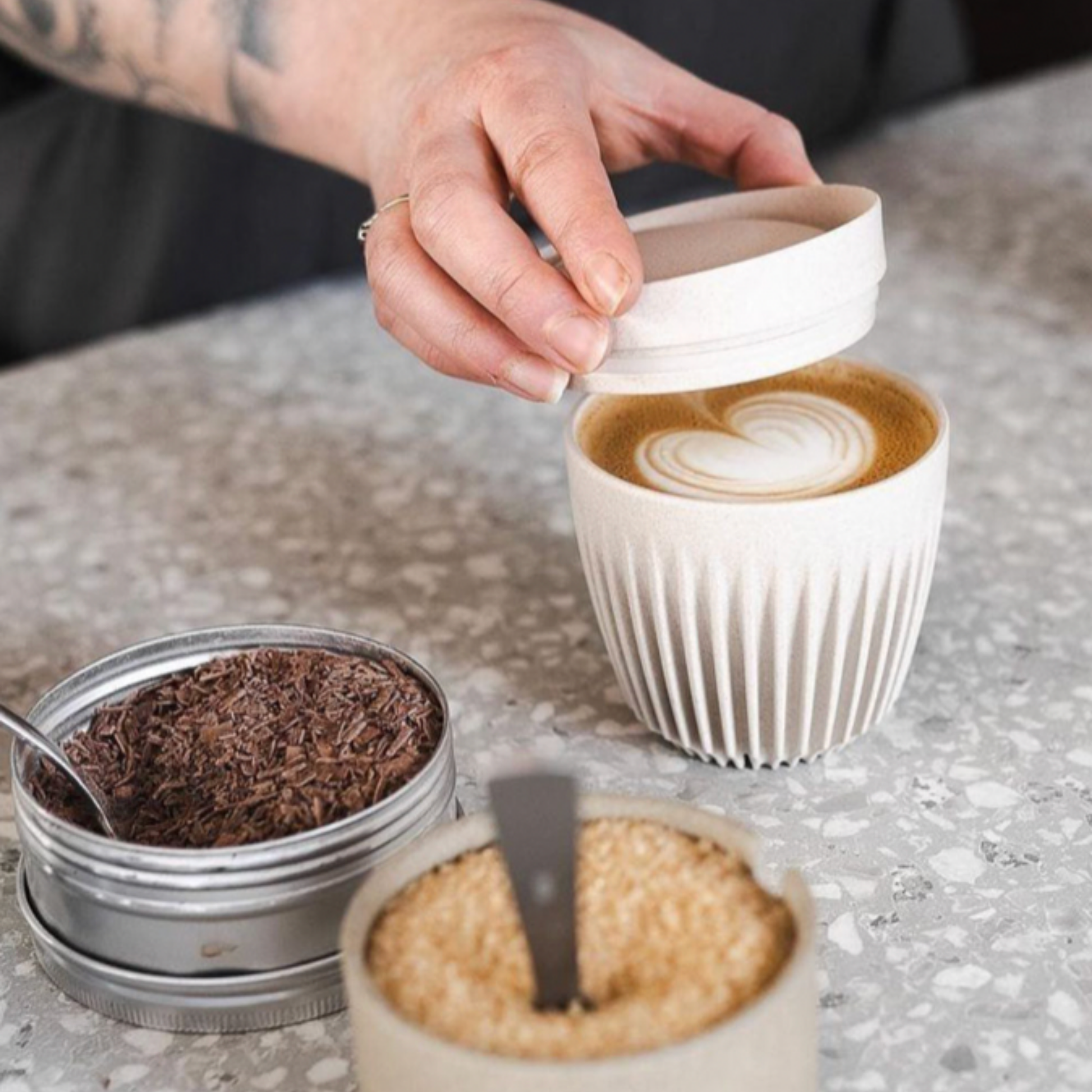 HuskeeCup 6oz with Lid Natural with coffee at coffee shop being prepared for takeway with Huskee lid