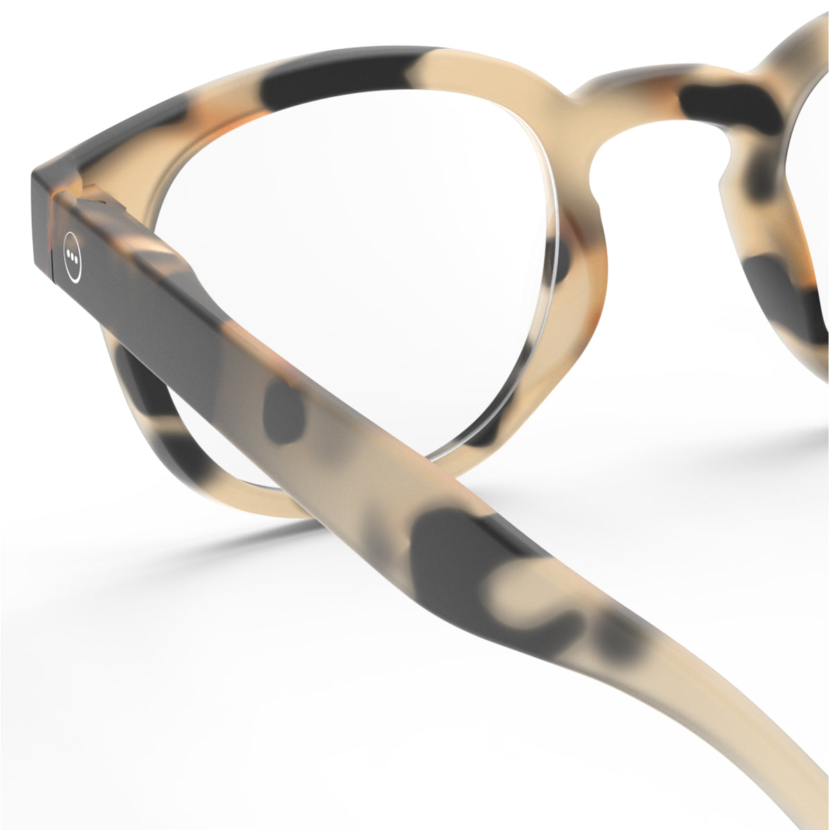 Izipizi shape c light tortoise reading glasses close up of back left hand side on white background